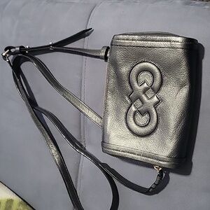 Cole Haan small crossbody bag. Super cute in great condition. Dark silver.